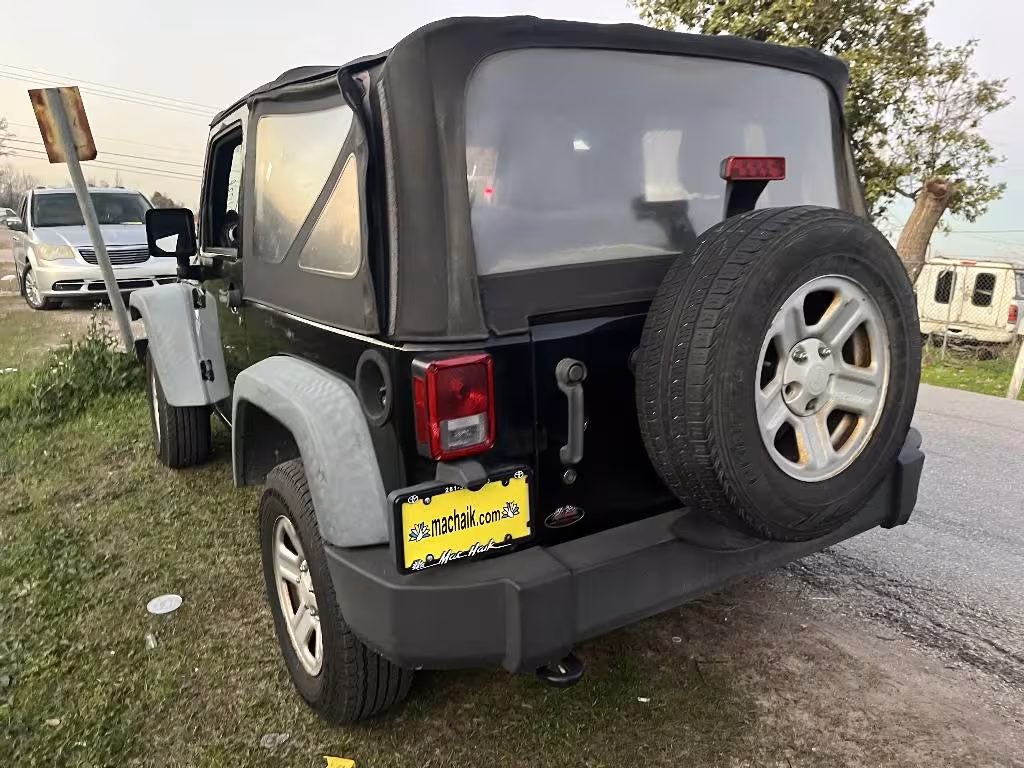 2011 Jeep Wrangler - 1J4AA2D17BL512897 - Image #2