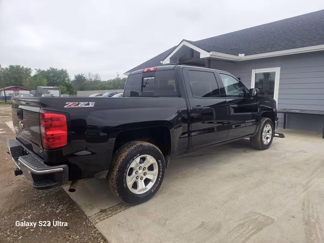 2014 Chevrolet Silverado 1500 - 3GCUKREC6EG132606 - Image #2